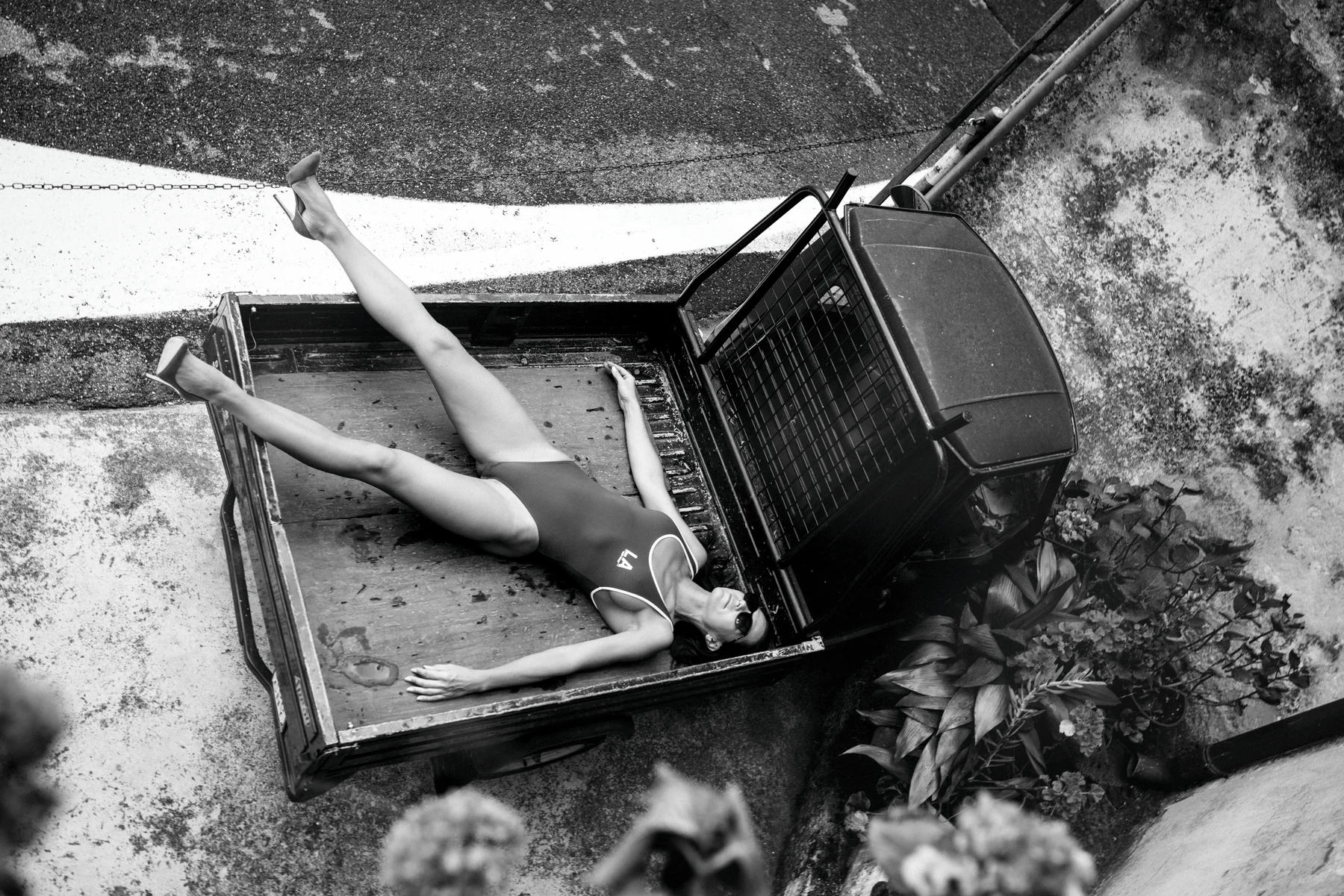 Performance Stage — A utility vehicle becomes a stage, seen from directly above. Photograph by Albert Pocej, Perfectly Normal.