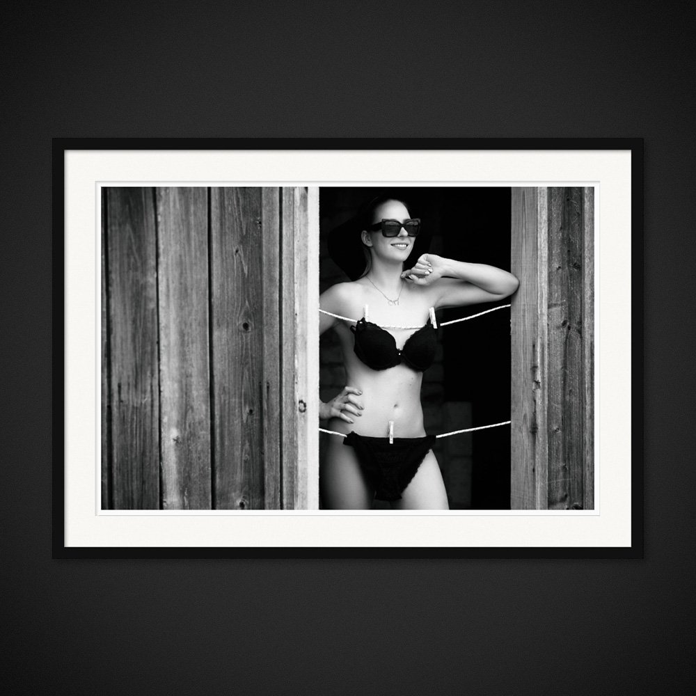 String Theory — Clotheslines cross a doorway and the figure standing within it. Framed edition by Albert Pocej.